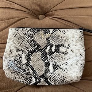 A perfect Victoria secret bag for traveling, emergency kit, and makeup bag